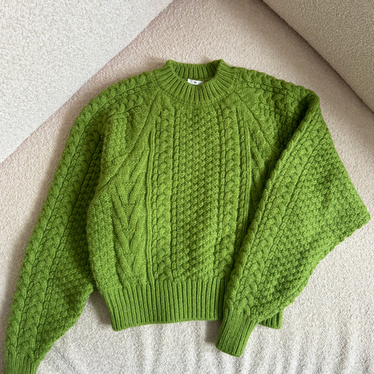 Green cable knit