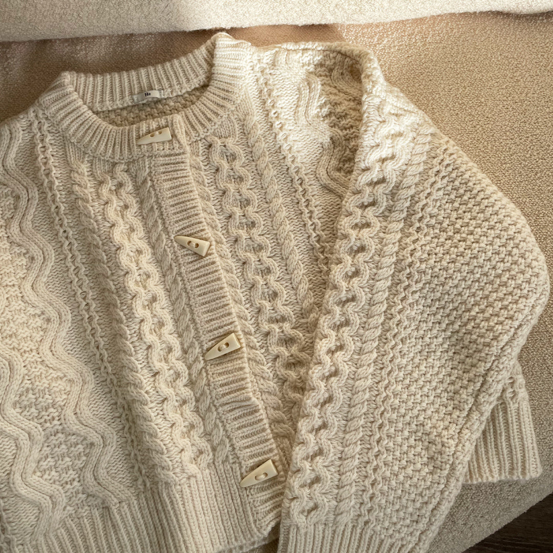 Cream cable buckle cardigan